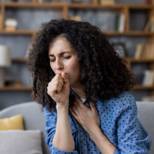Woman coughing